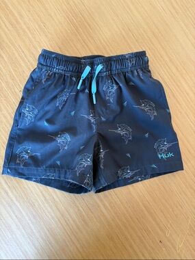 Huk Navy Marlin Pattern Swim Shorts with Aqua Drawstring